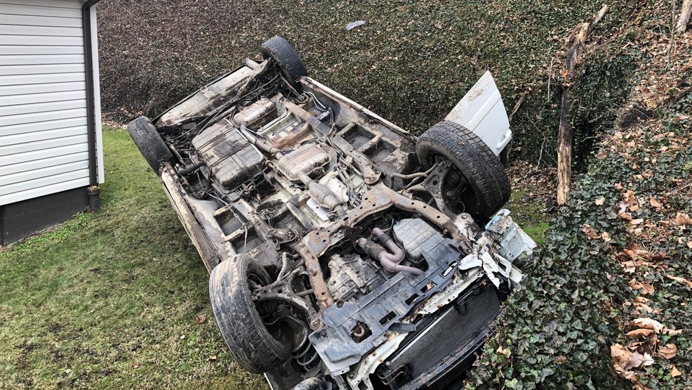 3 injured, 1 in custody after car crashes into Johnstown yard